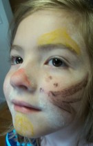 Hearty Naturals coconut oil face paint with flour powder finish.